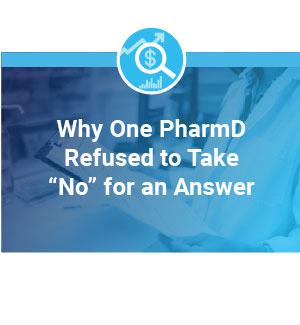 A young female pharmacist checking paperwork in the pharmacy